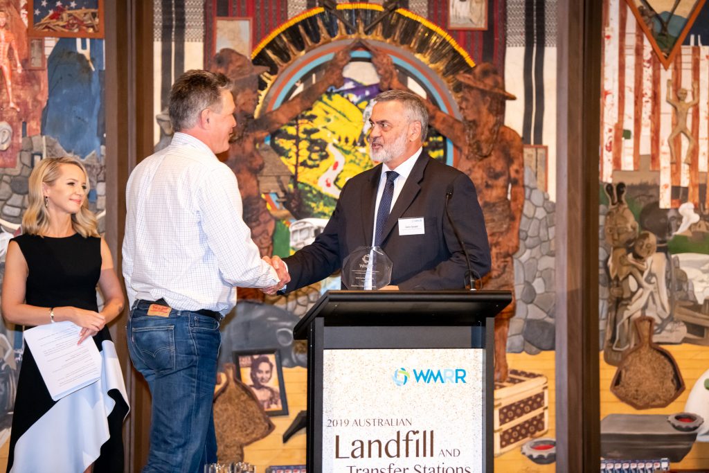 Colin Sweet, CEO of the Australian Landfill Owners Association, presenting Tony Stapleton, CEO of BeneTerra, with the Innovation Award