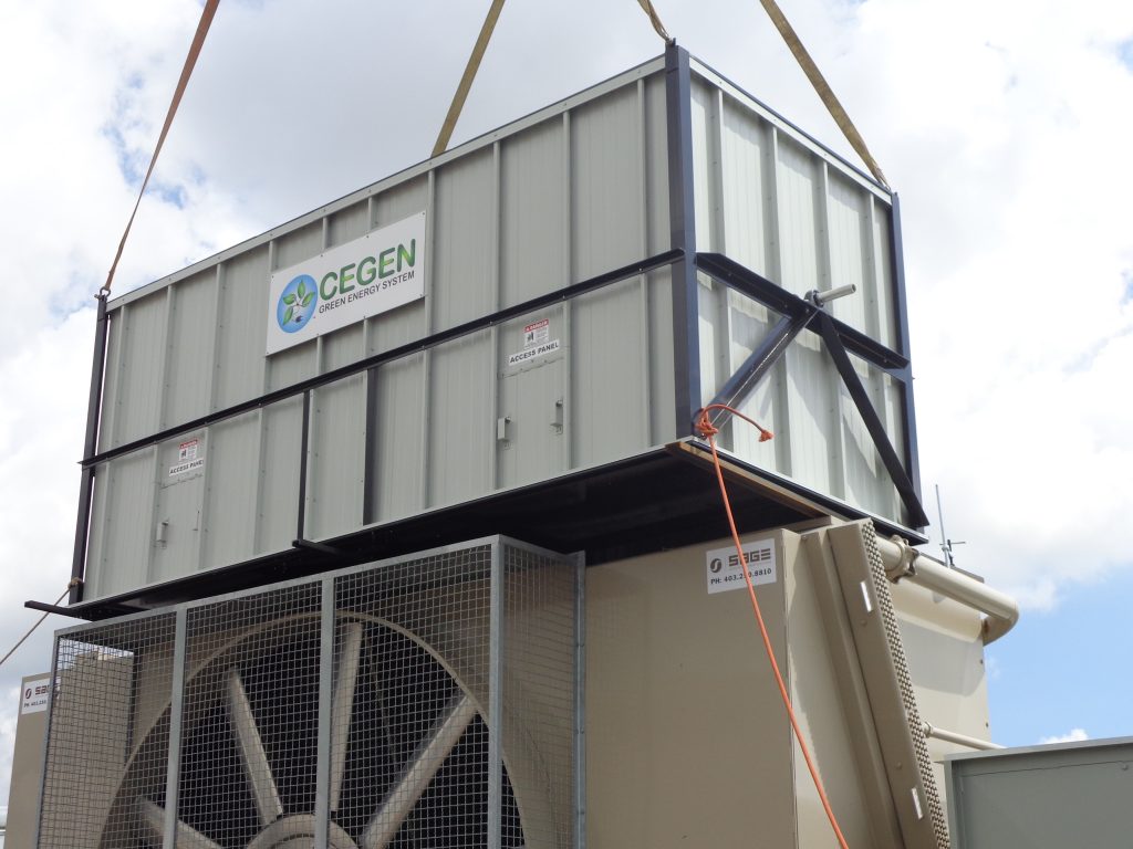 USING COOLER EXHAUST AIR TO CREATE GREEN ENERGY FOR GAS SITES